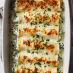 Cheesy Chicken Spinach Stuffed Crepes Bake